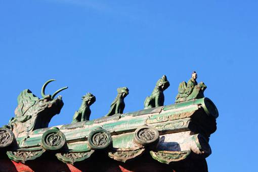 故宫屋脊上雕刻的老人是什么?