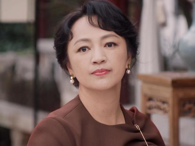 一生一世里秦婉是周生辰的生母吗